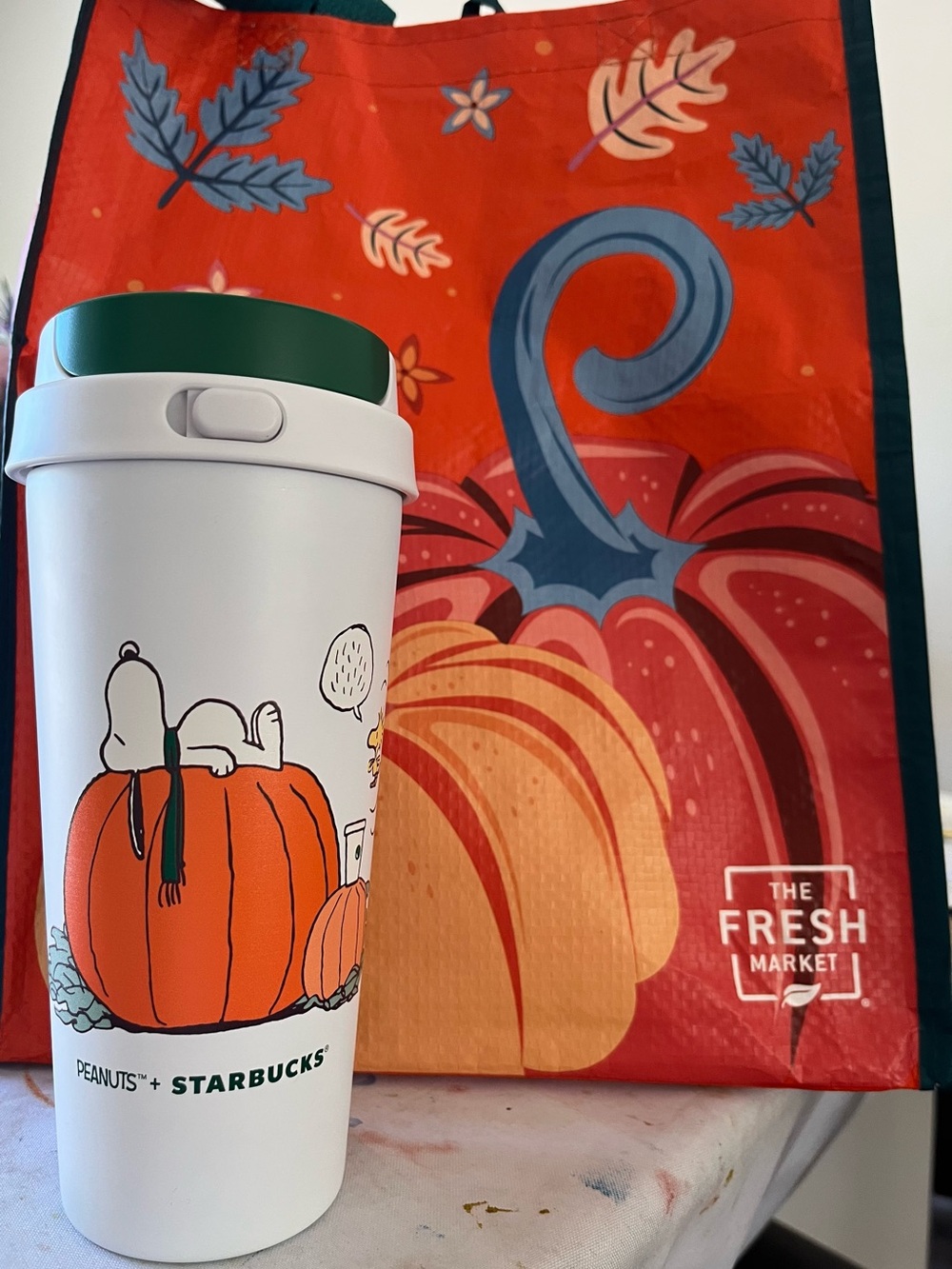 Starbucks White Travel Tumbler with Green Lid and Orange Pumpkin Art